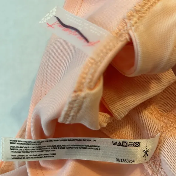 FP Movement XSmall Set In Your Corner Bra peach AND Way Home Shorts red earth